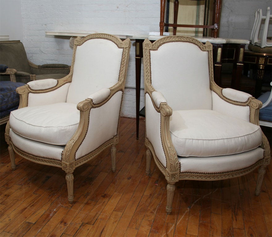 A Louis XVI style salon suite: A Settee and Pair of Bergeres