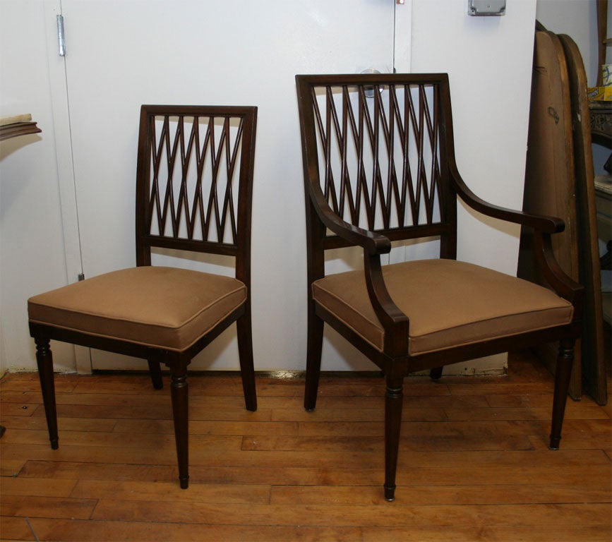 A very comfortable set of 4 side chairs and 2 arm chairs by Jansen .
