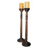 A Dramatic Pair of Decorative Wood Turned Candle Stands