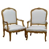Pair of 19th Century Gilded Louis XV/XVI Transitional Arm Chairs