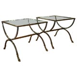 Pair of nickel finish side tables with brass hoof feet
