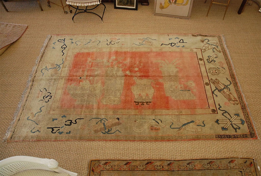 An Antique Samarkand Art Deco Rug . This elegant rug is from South East Asia and is dated 1st quarter 20th Century. It's center depicts an abstract form of Nigisha's 