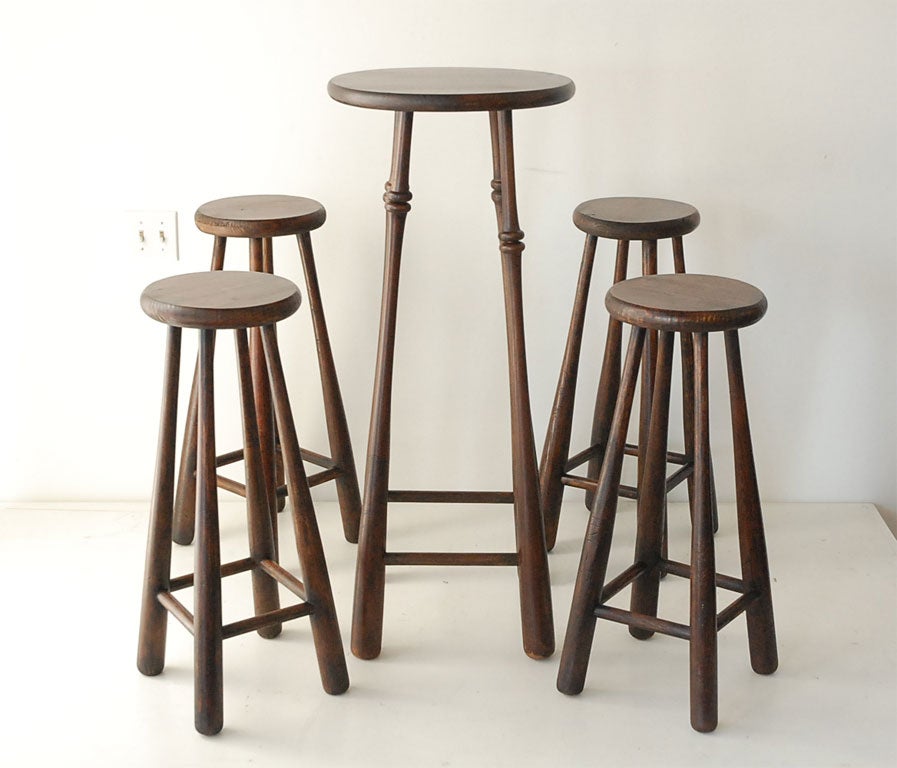 FOLKY HANDMADE BASEBALL BAT BAR STOOLS AND TABLE, MADE FROM ANTIQUE BASEBALL BATS,WHICH ARE ALL SIGNED BY THE MANUFACTURE.THE FINISH IS A DARKER NATURAL FINISH.WONDERFUL CONDITION AND A GREAT SURFACE !THIS SET IS A REAL FIND & QUITE UNUSUAL. SOLD AS