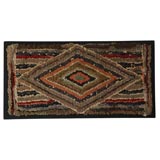 19THC FOLKY GEOMETRIC MOUNTED HOOKED RUG