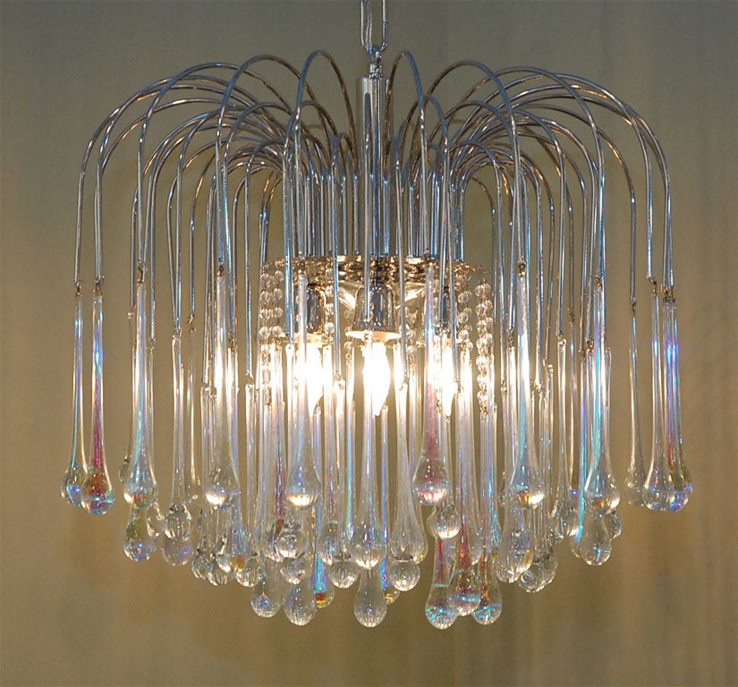 Crystal chandelier featuring teardrop glass, possibly Murano.