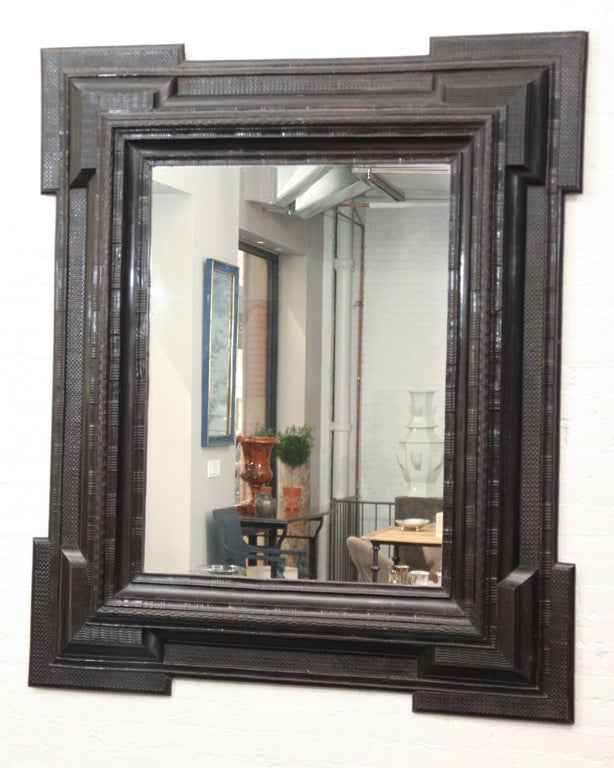 Carved Ebonized Wooden Frame