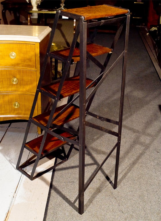 Industrial style wood and metal ladder.  Great for display.