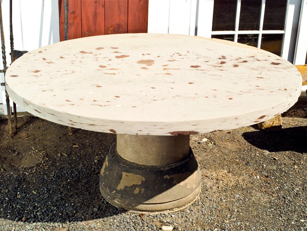 Comprising three parts (top, riser and base), this round carved Yorkstone dining table is perfect for the garden, conservatory, terrace or patio. The top has heavy iron deposits throughout and is now much darker than shown in photographs, so please