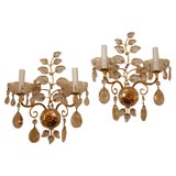 A pair of Bagues brass wall sconces A pair of Bagues brass wall sconces