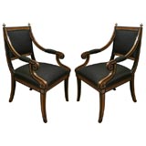Pair of  painted black and gold Regency Revival armchairs