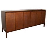 Paul McCobb walnut, cane, leather/brass sideboard, mfg. Calvin