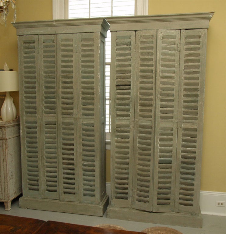 Pair shuttered cainets