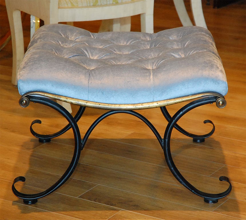 Black and gilt metal C-scroll tufted stool