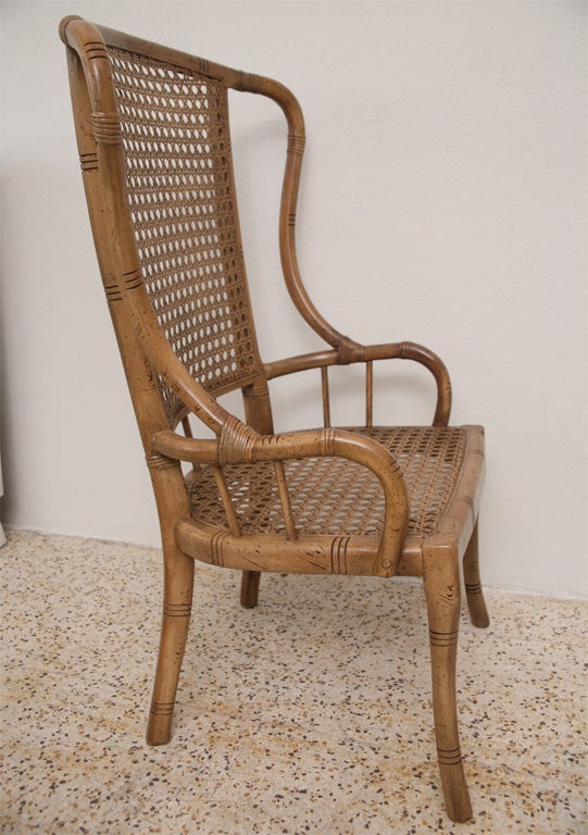 American Pair of 70's Faux Bamboo and Wicker Wing Chairs