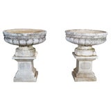 PAIR OF COMPOSED STONE URNS