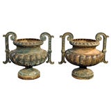 PAIR OF FOUNDRY STAMPED CAST IRON URNS