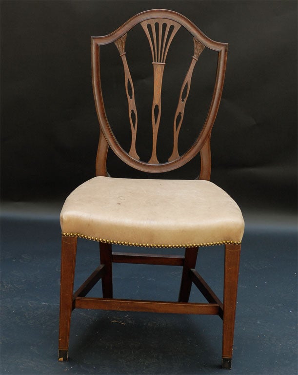 This is an American Shield Back Federal Chair in the Baltimore style.  The shield back, inlay, and legs are of Baltimore, MD.  This chair is made in the style of one that would have been made in 1790-1800; however, it is a 19th century chair.  This