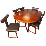 Exquisite Rosewood Dining Table set with 6 chairs by Arne Vodder