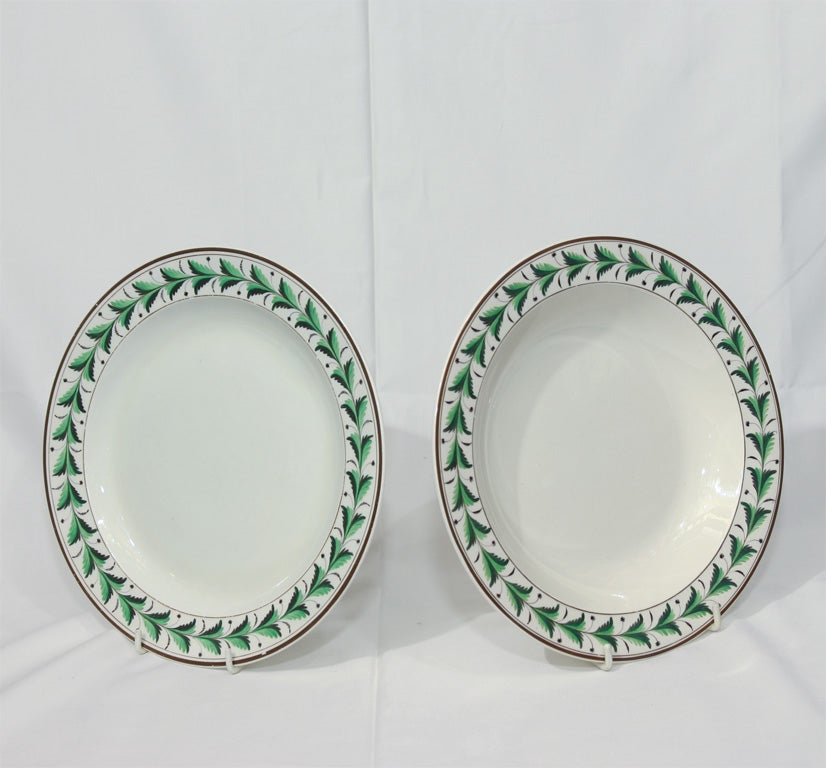 A set of 12 Creamware dinner dishes and we also have a separate set of 8 matching Creamware soup dishes have a beautiful border of vibrant green leaves and a brown painted edge.
The 8 soup dishes can be purchased for $1650 (now discounted to $1155).