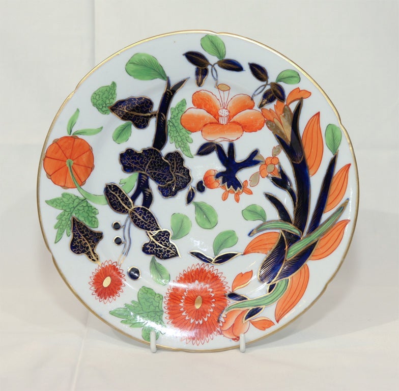 A pleasing  Coalport, Imari design balances the green of the leaves with the orange of the flowers and the blues of the vines.
We also have a set of a dozen soup dishes, a set of 8 dinner dishes , a pair of square dishes and a pair of shell shaped