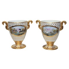 A Pair of  Nast Urns with Mythological Scenes