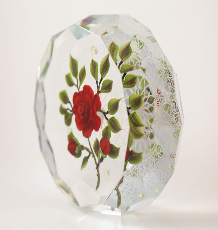 A fine Victor Trabucco paperweight plaque with a red rose and two buds, multi faceted with an engraved background