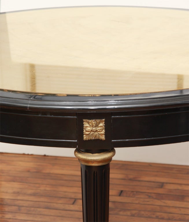 French Ebonized circular table by Jansen For Sale