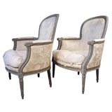 A Pair of Louis XVI Grey Lacquered Bergeres