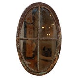 Oval Wrought Iron Window with Antiqued Mirror