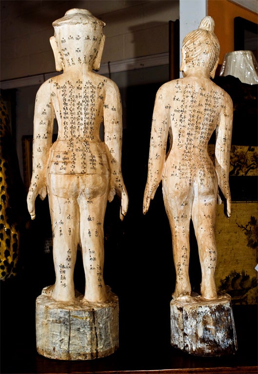 Interesting Chinese male and female acupuncture models from 3 Gorge's Area Clinic Used by doctors to explain procedures to patients. Carved wood and paint decorated. Female 21.5 tall, 8 wide by 5 deep.