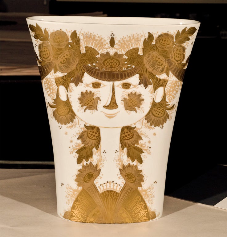 Contemporary vase by Rosenthal.  The highly stylized figure with gold decoration of ribbons, patterns and flowers. Stands at 12 5/8