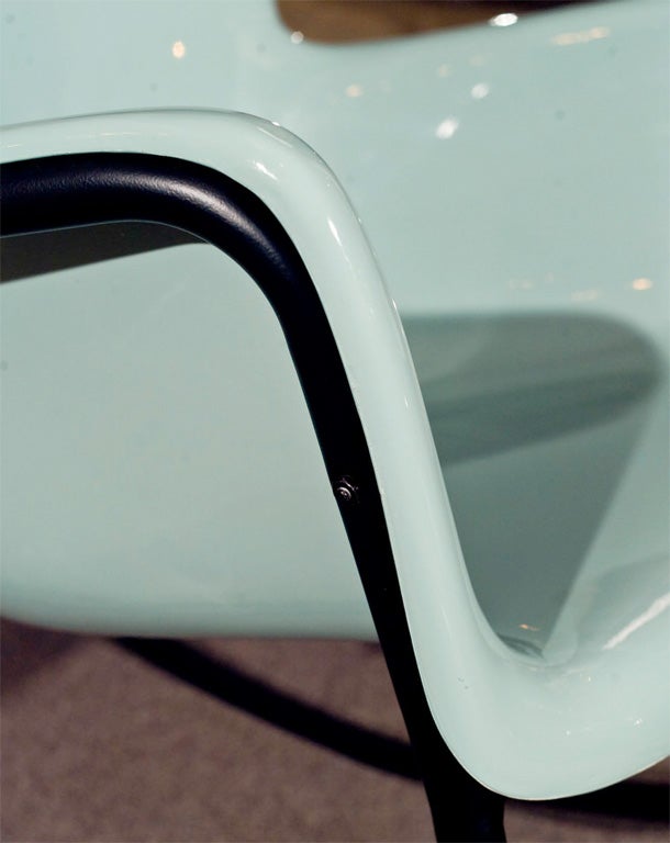 Offered here is a fab pair of Mid-Century Modern Rocking Chairs by Lawrence Peabody.  Fully restored fiberglass rockers with steel rocking bases, restored and powder coated in black.  The chairs have been professionally painted in 1964 Buick Skylark