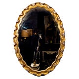 Vintage italian gilt wood oval mirror
