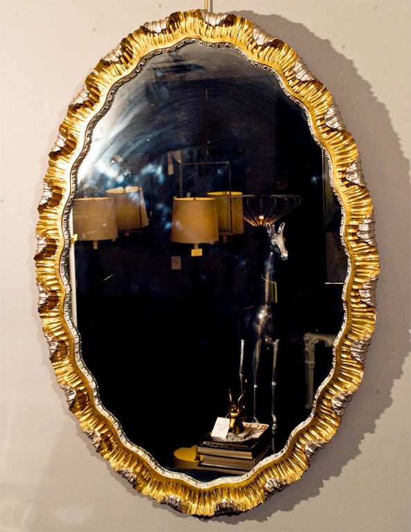 Vintage italian gilt wood oval mirror