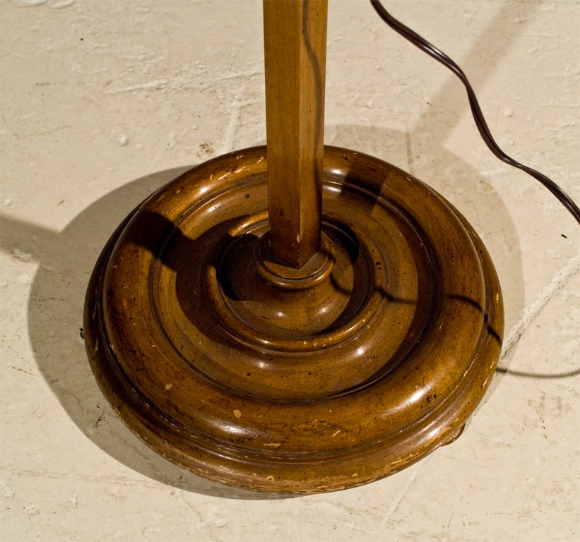 Decorators love these lamps for their usefulness and beauty.  Each adjust on a wooden ratchet that extend up to 5' tall.  The box pleat shade diffuses the light perfectly for reading.  Great next to a chair in a library.