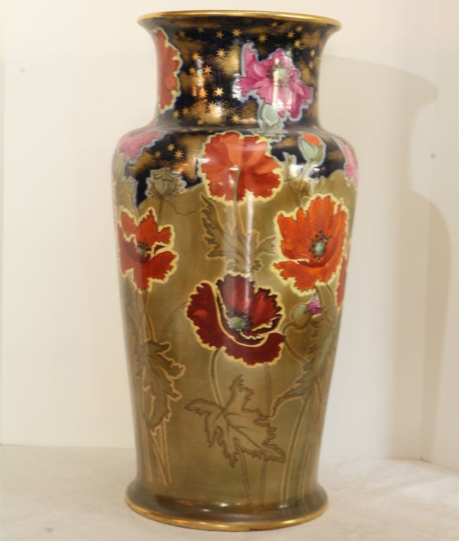 This 19th century Doulton Burslem large and impressive porcelain floor vase is a true show-stopper! Standing two feet tall, it is hand-painted with Aesthetic Movement / Arts and Crafts all-over decoration. The cobalt blue neck is over-painted with