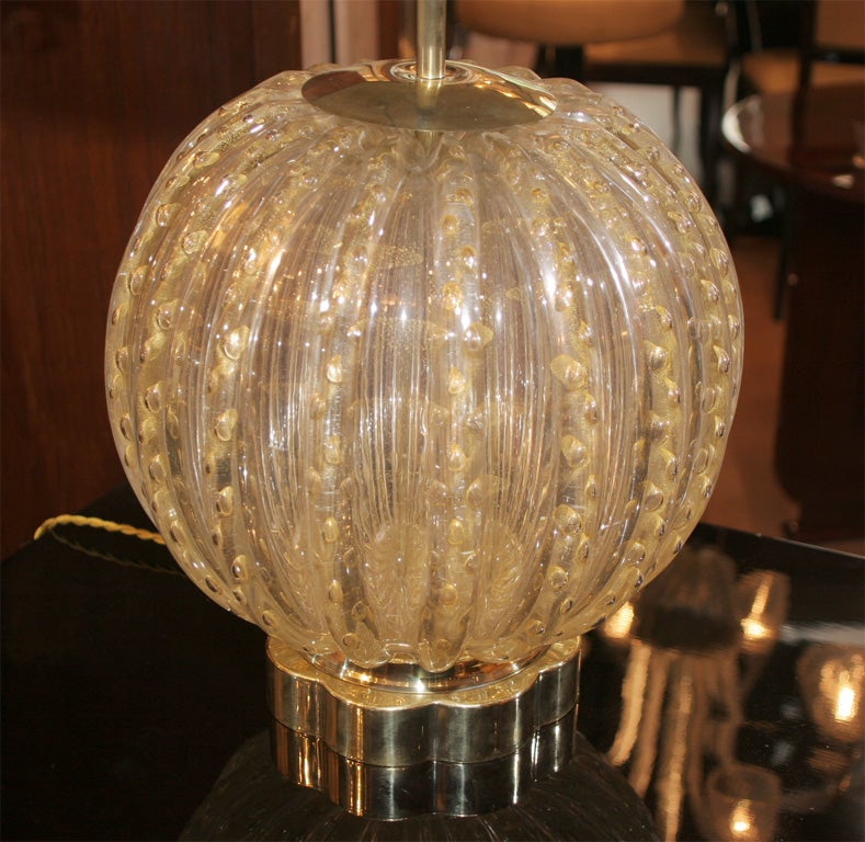 Large Art Deco table lamp , gold dust bubble Murano glass on original scalloped brass base.