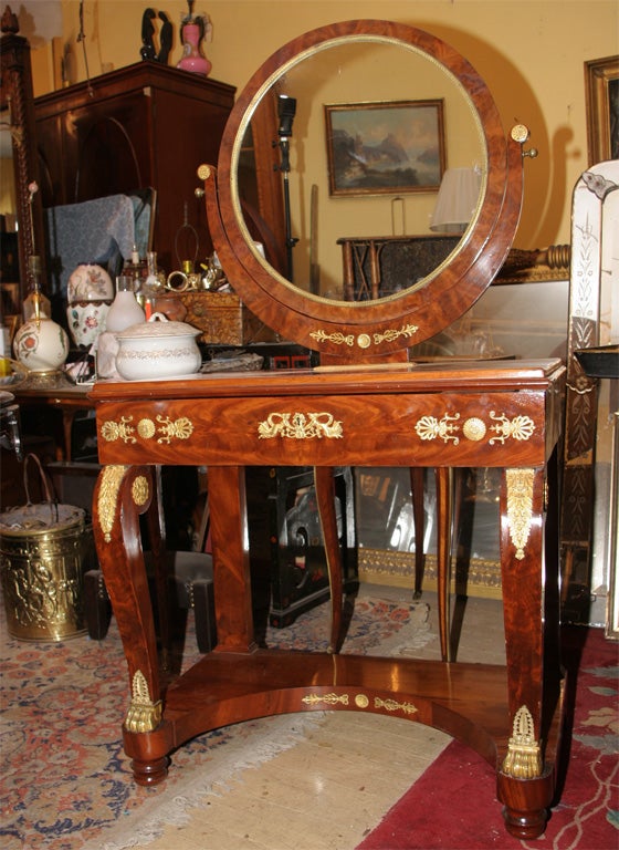 A wonderful mahogany (acajou) French Empire ladies Vanity.  Ormalu mounted, with interior writing surface.