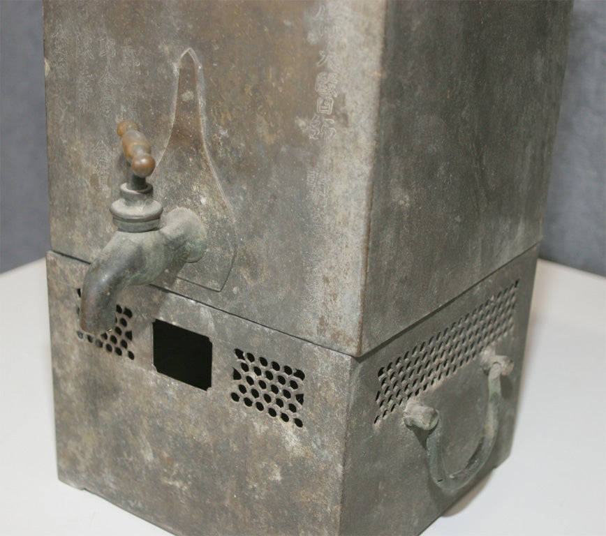 antique bronze water heater for transient tea merchants in china.