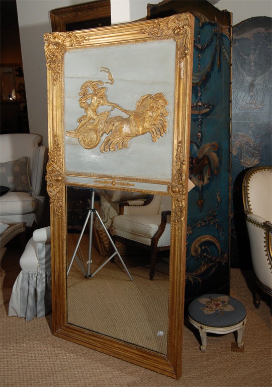 19th century trumeau mirror with gilt frame from France.