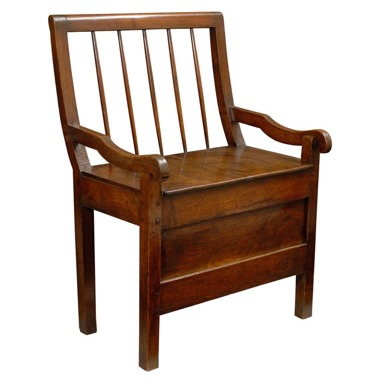 19th Century English Chestnut Comb Back Chair with Curved Arms and Long Apron For Sale