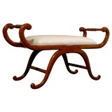 bench with curved arms and curved legs