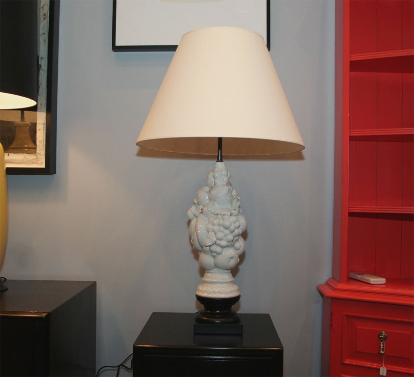 Pair of  White Porcelain  Fruit Motif  Lamps on Black Bases