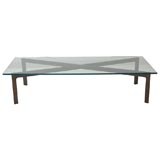 Large X Base Cocktail Table with Bronze Patina and Glass Top