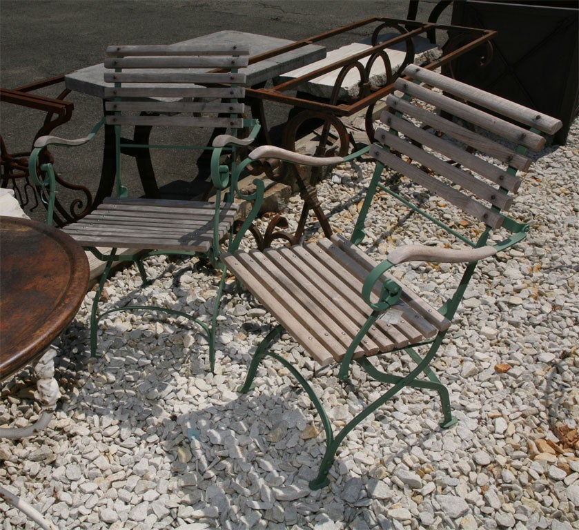 French Bistro Style Folding Chair with Arms.  Can be used both as indoor or outdoor chairs.  Also great as kitchen table chairs or use on the patio.