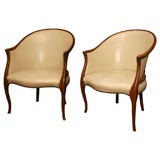 Carved frame barrel shaped Arm Chairs