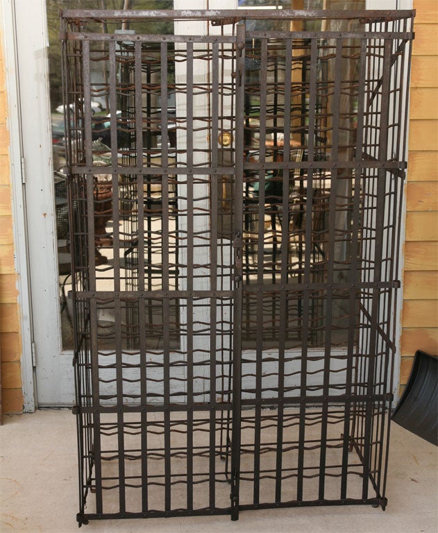 Traditional enclosed wine rack with doors that can be locked.  300 bottle capacity.  Perfect for that special wine cellar or tasting room.  2 tabs in the back allowing you to secure it to a wall or just left as free standing unit.