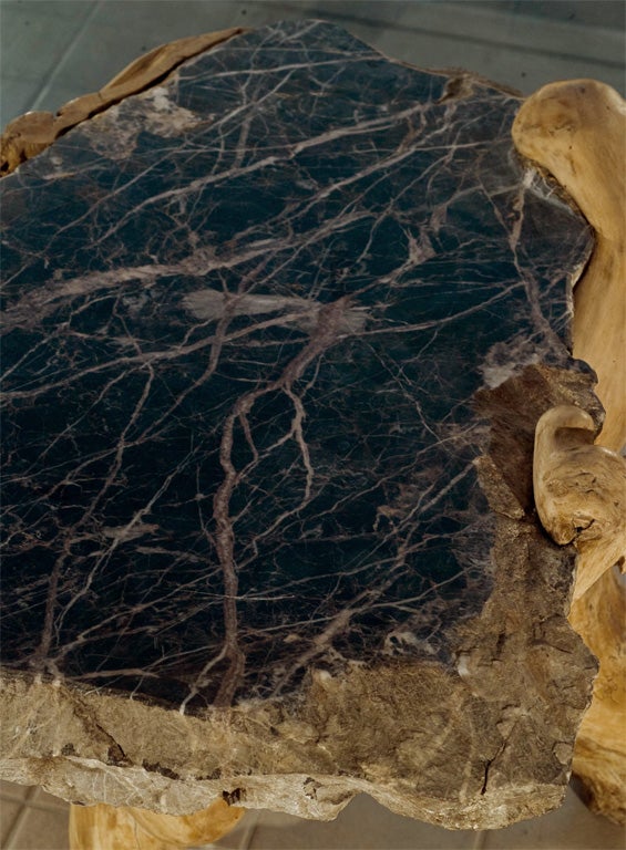 Root art: Table with imbedded rock