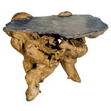 Root art: Table with imbedded rock