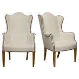 Pair of Vintage White Leather Wing Chairs